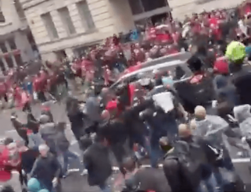 British man arrested after ramming car into Liverpool fans at parade